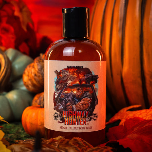 Bottle of 'Halloween Hunter' soap with pumpkins and leaves in the background