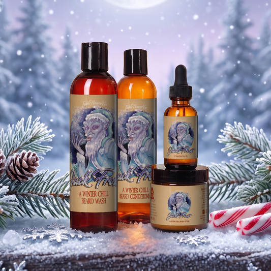 Jack Frost Complete Butter Kit with beard oil, butter, wash and conditioner in Christmas Pine, Fir Trees and Peppermint Stick scent on a frosted log with snowy pine branches, pine cones and candy canes in a moonlit winter forest, Fable Beard Co.