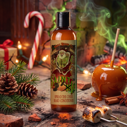 Saint Ick Beard Conditioner 8 oz bottle in Caramel Apple Cider, Campfire S'mores and Evergreen Essence scent beside a caramel apple, pine cones and toasted s'mores, Fable Beard Co.