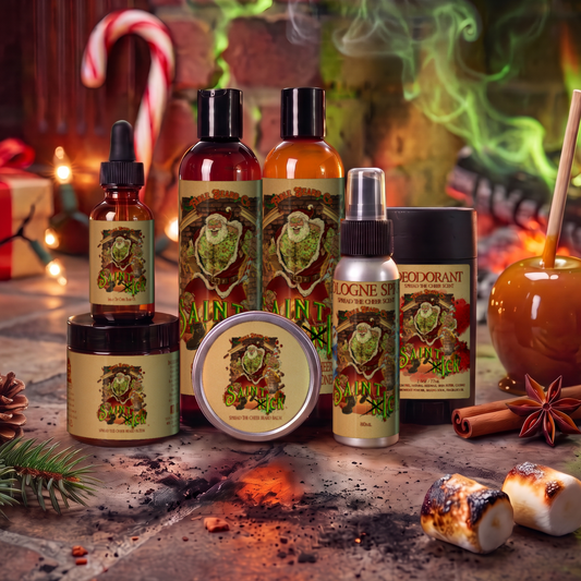 Saint Ick Ultimate Bundle with beard oil, balm, butter, wash, conditioner, deodorant and cologne in Caramel Apple Cider, Campfire S'mores and Evergreen Essence scent beside a caramel apple, pine cones and toasted s'mores, Fable Beard Co.