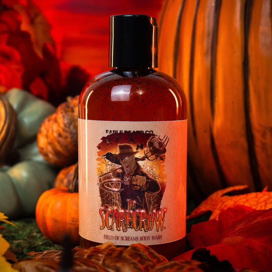 Bottle of 'Scarecrow' soap with autumn-themed background